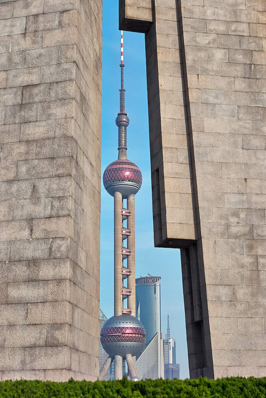 Shanghai War Memorial framing Pearl TV Tower